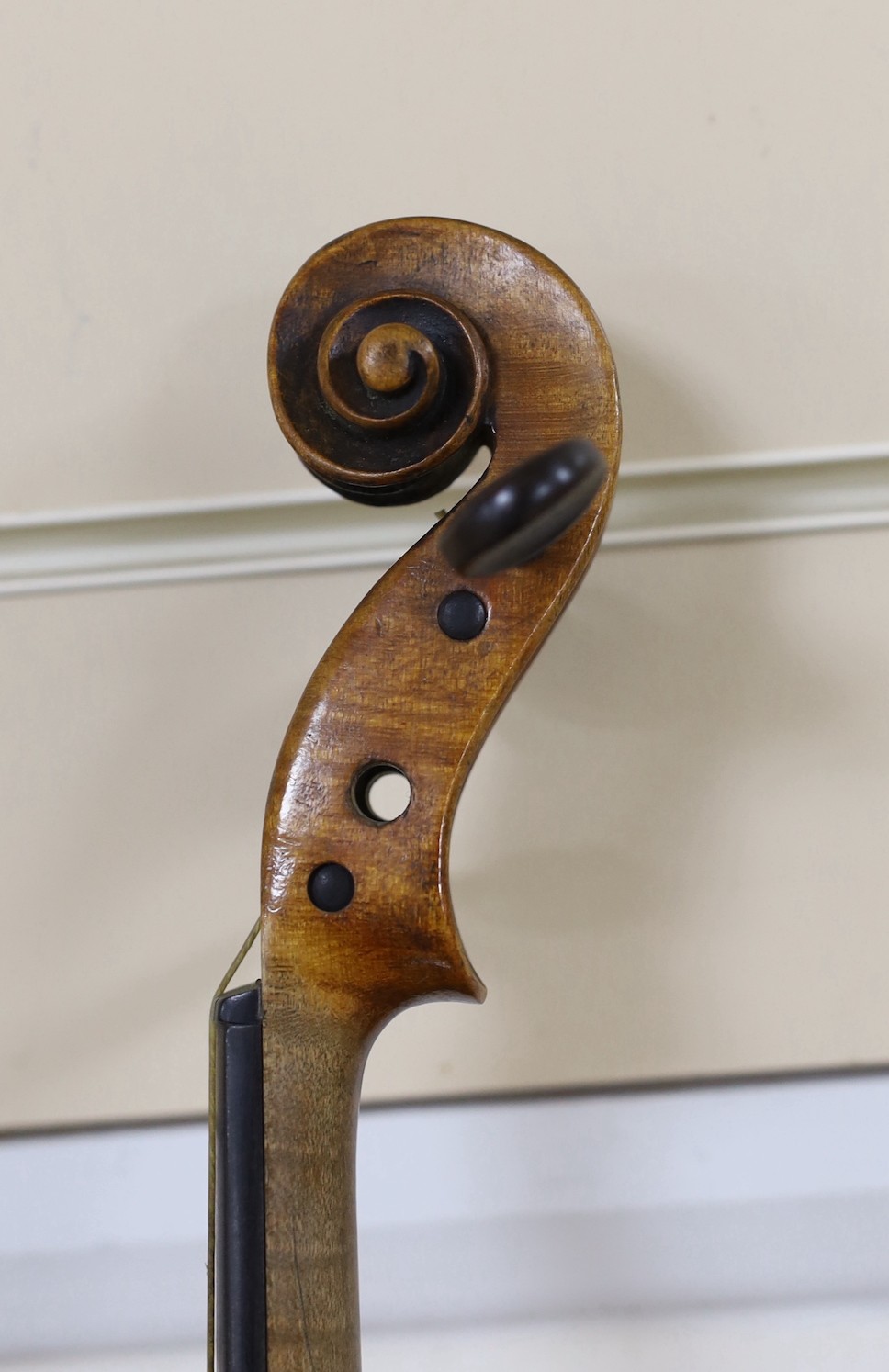A cased German violin, 60cms long